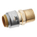 A SharkBite brass threaded connector with a gold finish.