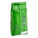 A green bag of Green Mountain Coffee Roasters Dark Magic whole bean coffee.