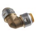 A brass SharkBite 90 degree elbow pipe fitting.