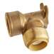 A SharkBite brass pipe fitting with a white background.