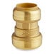 A SharkBite brass pipe fitting with a gold finish.