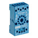 A blue Cooking Performance Group 11-pin relay base with two holes on the side.
