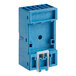 A blue plastic box with a metal screw.