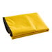 A yellow vinyl bag with black trim for a 3-shelf cart.