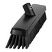 A close up of a black Vikan push broom head with soft and stiff bristles.