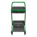 A green and grey Vikan HyGo mobile cleaning station with a shelf and two baskets.