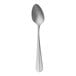 A Sola stainless steel demitasse spoon with a silver handle.