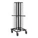 A black metal JackStack pizza plate rack with red wheels.