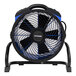 An XPOWER blue and black professional axial fan on a stand.