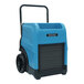 A blue and black XPOWER commercial dehumidifier with wheels.