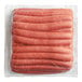 A package of Sabrett Skinless Beef Franks in plastic.