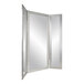 A white rectangular object with a silver framed trifold mirror on it.