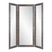 A BrandtWorks trifold dressing mirror with a wooden frame.