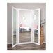 A BrandtWorks white trifold dressing mirror.