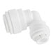 A close-up of a John Guest white polypropylene pipe fitting.