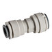 A grey plastic John Guest pipe fitting with white Superseal ends.