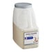 A plastic jug of McCormick Culinary Garlic Powder on a white background.