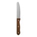 A Varick steak knife with a rounded serrated stainless steel blade and a pineapple wood handle.