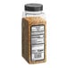 A jar of McCormick Grill Mates Cracked Black Pepper and Garlic with Sea Salt Seasoning on a white background.