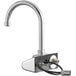 A Waterloo chrome wall-mount hands-free sensor faucet with a gooseneck spout and cable attached to it.