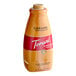 A bottle of Torani Puremade Caramel flavoring sauce.