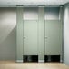 An ASI Accurate Partitions Moisture Guard plastic laminate bathroom stall partition with two doors enclosing a toilet.