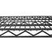 A black Metro Super Erecta wire shelf with a grid pattern.