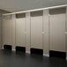 An ASI Accurate Partitions black core phenolic bathroom stall with four doors.