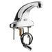 A Waterloo chrome deck-mount hands-free sensor faucet with a cable attached.