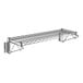 A close-up of a Regency chrome wire shelf with two shelves and a metal bar.