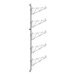 A Regency stainless steel wall-mount shelf post with single brackets on it.