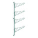 A green metal Regency wall-mounted rack with four shelves and single brackets.