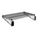 A black wire shelf with black metal brackets.