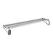 A Regency chrome wire shelf on a wall.