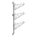 A chrome Regency wall-mount shelf post with three brackets and shelves.