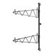 A pair of black metal Regency wall-mount brackets.