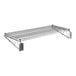 A chrome Regency wall-mount wire shelf.