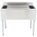 A stainless steel Eagle Group underbar ice bin with eight bottle holders.