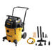 A yellow and black DeWalt wet/dry vacuum cleaner.