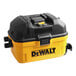 A DeWalt yellow and black wet/dry vacuum with tool kit.