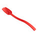 A red polycarbonate salad bar spoon.