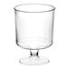 A clear plastic wine cup with a small base.