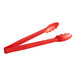 A pair of red tongs with scalloped grips.