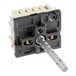 A black and white Robertshaw infinite switch with a metal screw in it.