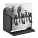 A black and white Narvon refrigerated beverage dispenser with three plastic containers.