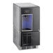 A black and silver Follett 7 Series undercounter ice machine with blue lights.