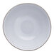 A white bowl with a brown rim.