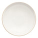 A white stoneware bowl with a gold rim.