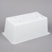 A white plastic rectangular container with two holes on top.