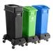 A Lavex rectangular trash station with black, green, and blue lids on wheels.